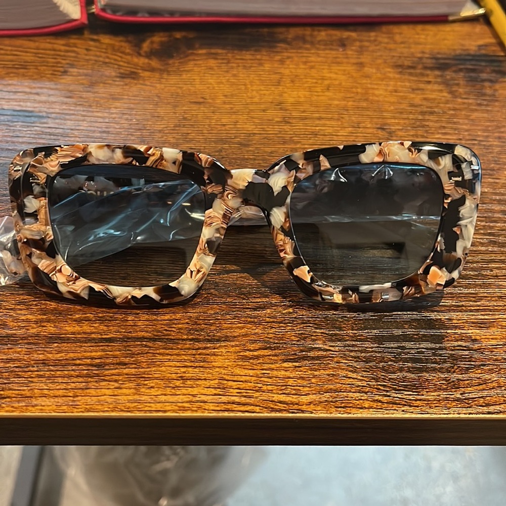 Filling Pieces  brand new sunglasses.